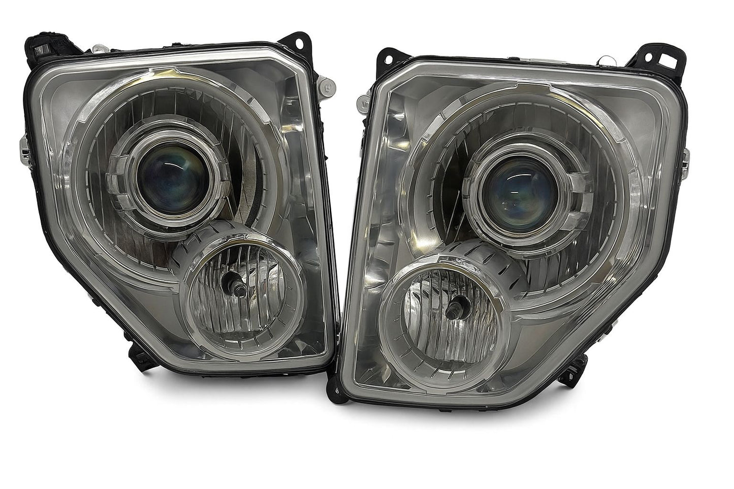 Pair of Jeep Liberty LED headlights on a white background